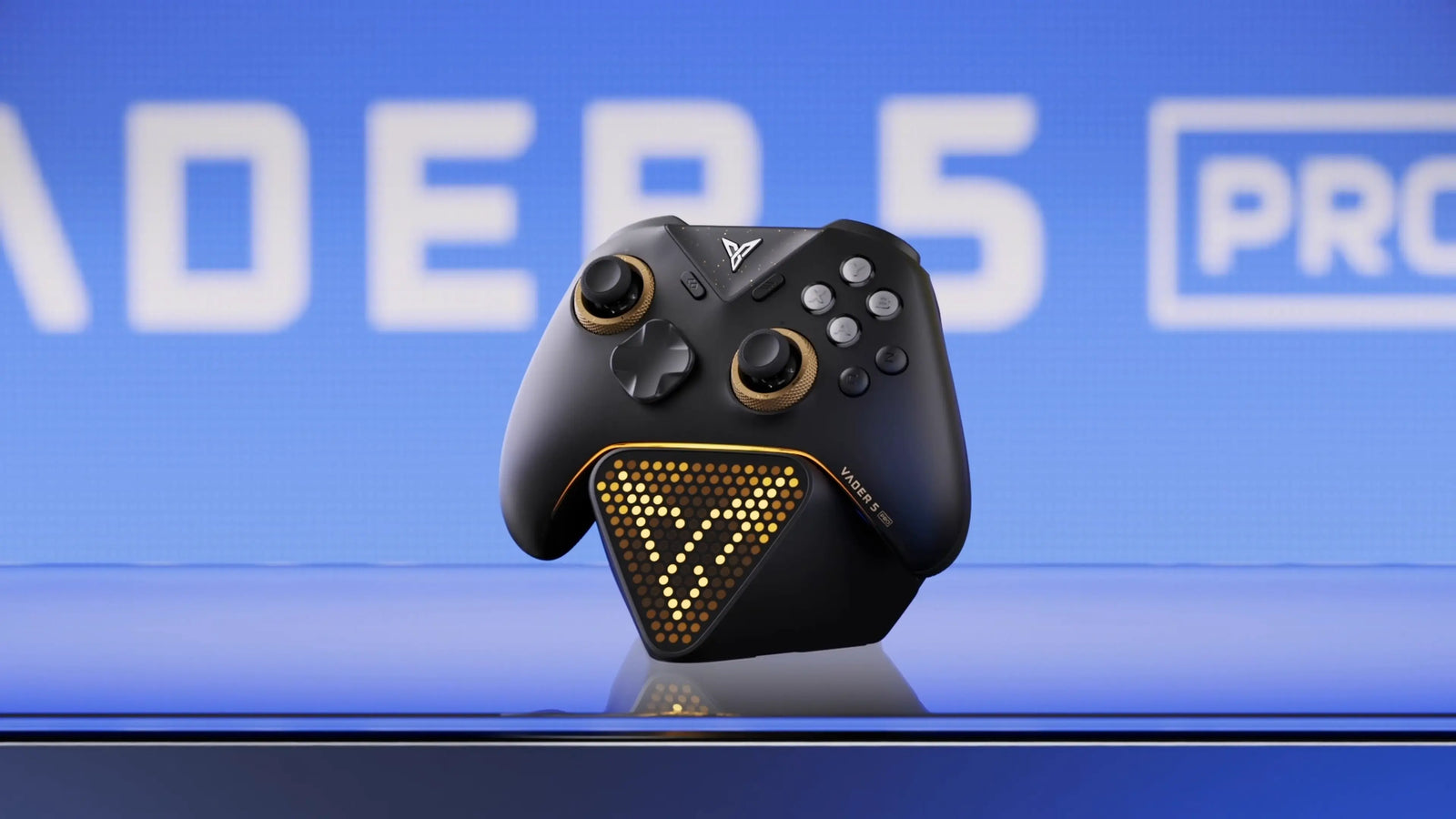 Flydigi Vader 5 Pro wireless gaming controller shown in a hands-on unboxing with a focus on its finish, grip and control layout